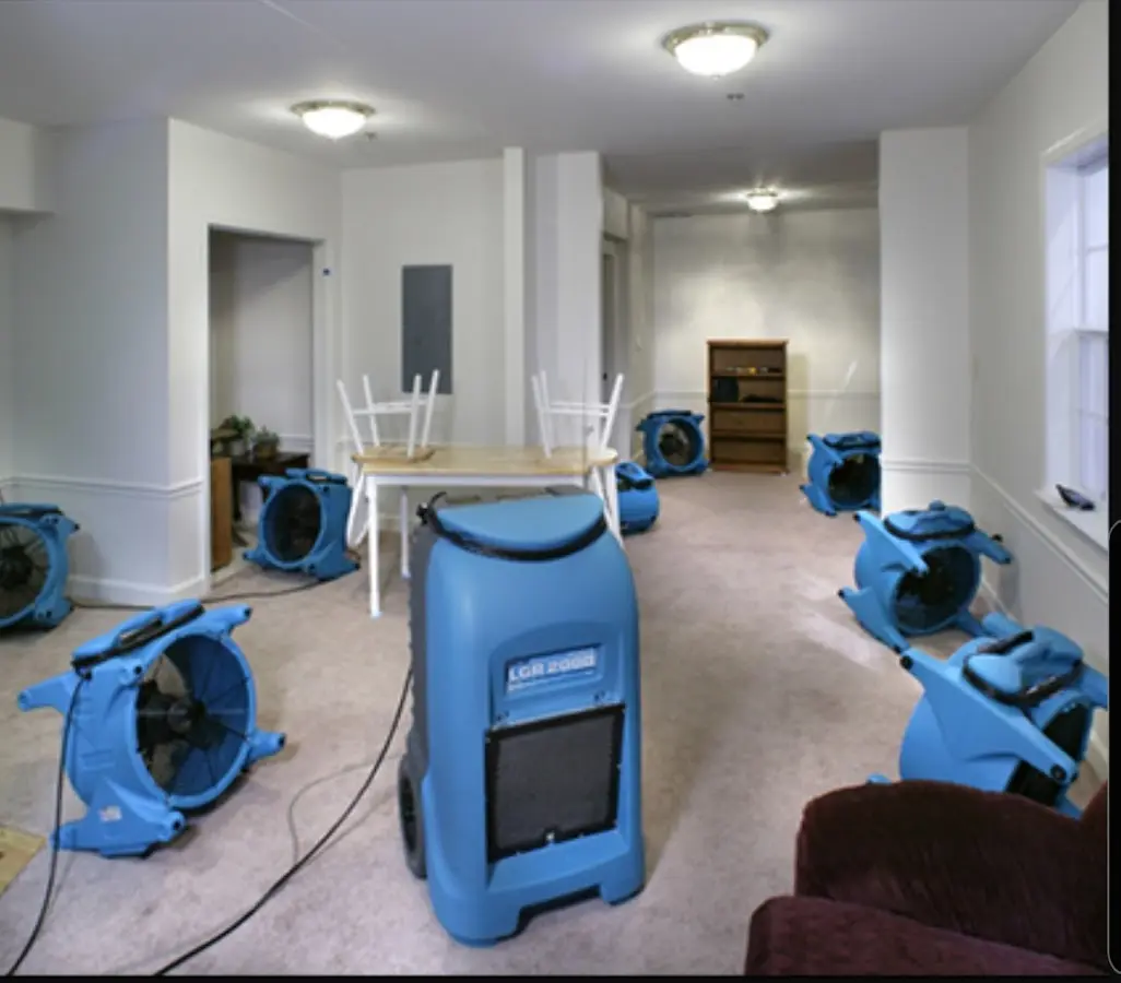 Air movers and dehumidifier setup for Water Extraction & Removal in Keystone